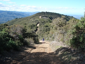 Walking along a hilly trail